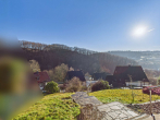 Ausblick - Familienfreundliches Wohnen mit Weitblick – Ihr neues Zuhause mit Kamin, Garten und Privatsphäre
