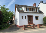 Ansicht - Gemütliches Wohnhaus mit Nebengebäuden sucht tatkräftigen Eigentümer nach Flutschaden