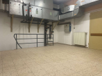 Raum mit Zugang zum Keller und zur Verkaufsfläche - Großzügige Gewerbefläche im Zentrum von Hellenthal