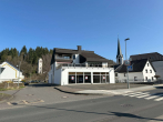 Ansicht und Freifläche - Großzügige Gewerbefläche im Zentrum von Hellenthal