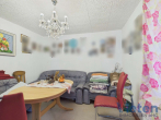 Wohnzimmer (Hs. Nr. 5, EG, rechts) - Mehrfamilienhaus-Ensemble mit 8 Wohneinheiten und Sanierungspotenzial