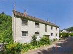 Straßenansicht Hs. Nr. 7 - Mehrfamilienhaus-Ensemble mit 8 Wohneinheiten und Sanierungspotenzial