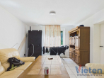Wohnzimmer (Hs. Nr. 7, EG, links) - Mehrfamilienhaus-Ensemble mit 8 Wohneinheiten und Sanierungspotenzial