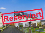Ansicht - Großzügiges Wohnhaus mit flexibler Nutzung und Garagenensemble in ruhiger Eifellage