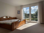 Schlafzimmer (EG) - Sie suchen ein lichtdurchflutetes Einfamilienhaus mit Ausblick ins Grüne?