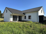Rückansicht - Sie suchen ein neu errichtetes & schickes Wohnhaus mit Garten zur Miete? (Gartenaufbau im August 24)